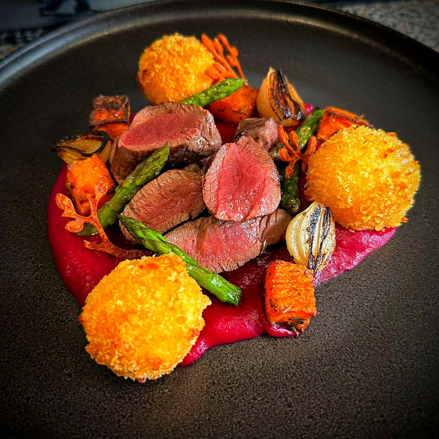 Venison with beet purée and croquettes